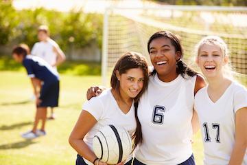 Girls-playing-hockey.jpeg